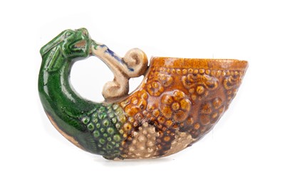 Lot 1206 - A CHINESE SANCAI GLAZED POTTERY RHYTON