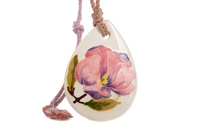 Lot 268 - A MOORCROFT POTTERY MAGNOLIA PENDANT