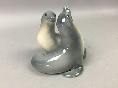 Lot 425 - A ROYAL COPENHAGEN GROUP OF TWO SEALS, TWO BORDER FINE ARTS DOGS AND TWO SILVER NAPKIN RINGS