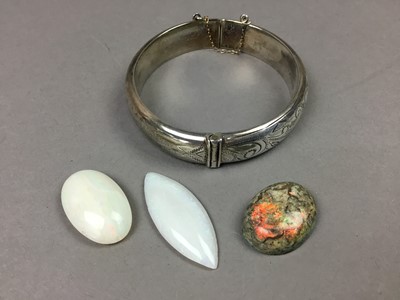 Lot 480 - A SILVER BANGLE AND OPALS
