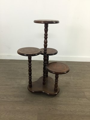 Lot 122 - A FOUR TIER PLANT STAND AND A DROP LEAF TABLE