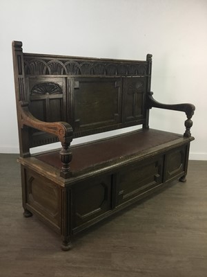 Lot 126 - A 19TH CENTURY OAK CARVED HALL BENCH