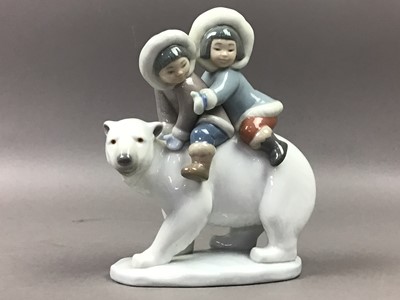 Lot 34 - A LLADRO FIGURE GROUP OF TWO ESKIMO CHLDREN ON A POLAR BEAR