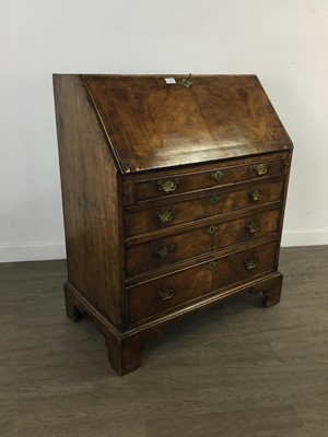 Lot 104 - A WALNUT REPRODUCTION BUREAU