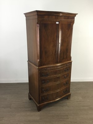 Lot 107 - A MAHOGANY REPRODUCTION SERPENTINE CABINET ON CHEST