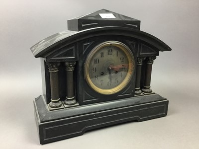 Lot 133 - A BLACK SLATE MANTEL CLOCK