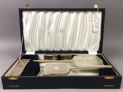 Lot 141 - A SILVER VANITY SET IN A FITTED CASE