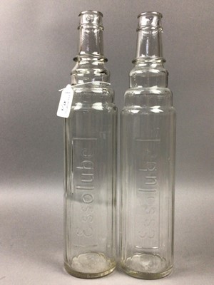 Lot 47 - A PAIR OF EARLY 20TH CENTURY ESSO LUBE GLASS BOTTLES