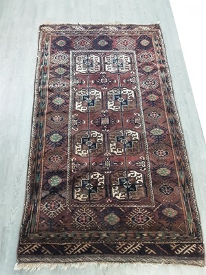 Lot 191 - A BOKHARA BORDERED RUG