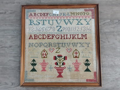 Lot 188 - A NEEDLEWORK SAMPLER