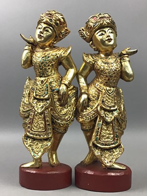 Lot 185 - A PAIR OF ASIAN GILDED CARVED WOOD DANCING FIGURES