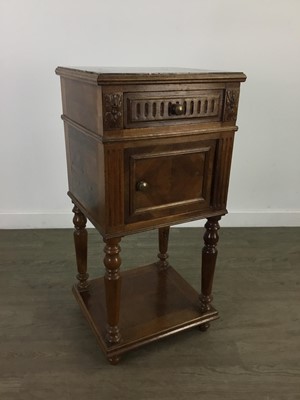 Lot 177 - A FRENCH WALNUT BEDSIDE CABINET