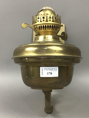 Lot 178 - A PAIR OF CAST BRASS HANGING OIL LAMPS