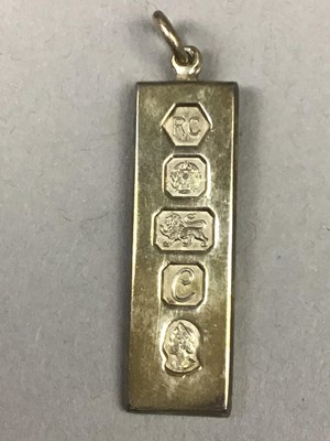 Lot 215 - FOUR SILVER INGOT PENDANTS