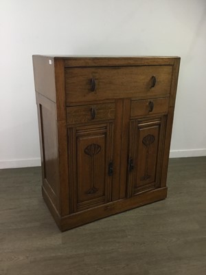 Lot 67 - AN EARLY 20TH CENTURY OAK CABINET