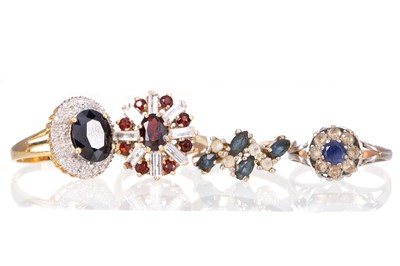 Lot 504 - FOUR CLUSTER RINGS