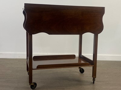 Lot 76 - A MAHOGANY DRINKS TROLLEY, FOLDING CAKE STAND AND A TABLE