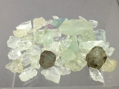 Lot 363 - **A COLLECTION OF CERTIFICATED UNMOUNTED GROUPS OF ROUGH GEMSTONES