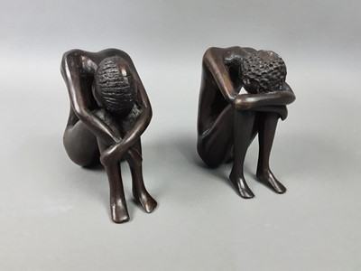 Lot 403 - A PAIR OF BRONZE SEATED FIGURES