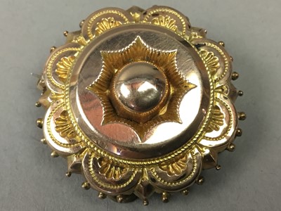 Lot 389 - A VICTORIAN GILTMETAL CIRCULAR BROOCH AND A FRENCH DOG BROOCH