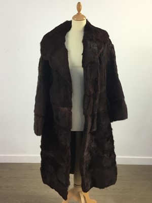 Lot 431 - A BROWN FUR COAT