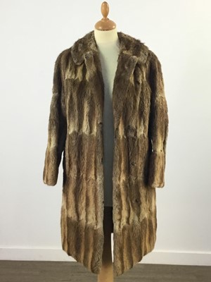 Lot 432 - A LIGHT BROWN FUR COAT