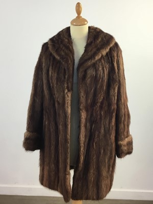 Lot 435 - TWO BROWN THREE QUARTER LENGTH FUR COATS