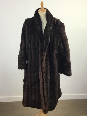 Lot 435 - TWO BROWN THREE QUARTER LENGTH FUR COATS