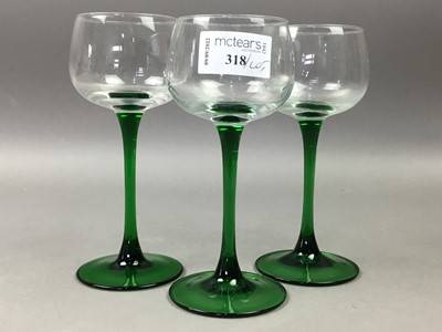 Lot 318 - A SET OF EIGHT GREEN STEMMED HOCK GLASSES AND OTHER GLASS WARE