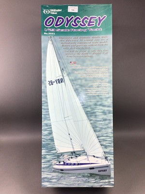 Lot 520 - AN ODYSSEY 1/23 SCALE RACING YACHT AND TWO OTHER MODEL BOATS