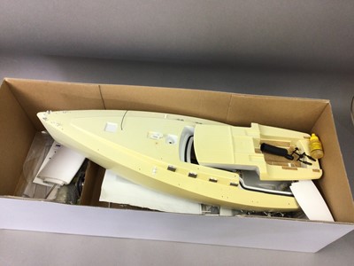 Lot 520 - AN ODYSSEY 1/23 SCALE RACING YACHT AND TWO OTHER MODEL BOATS