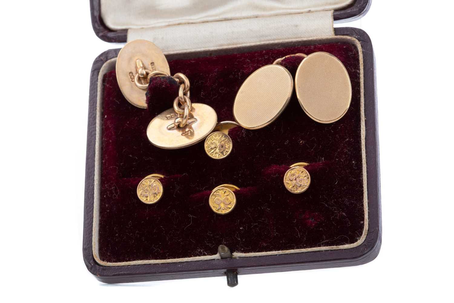 Lot 1111 - A PAIR OF GOLD CUFFLINKS AND A SET OF SHIRT STUDS