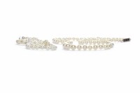 Lot 195 - TWO TWENTIETH CENTURY PEARL NECKLACES one with...