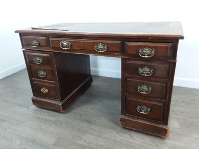 Lot 450 - AN EDWARDIAN OAK PEDESTAL WRITING DESK