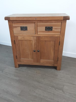 Lot 546 - A MODERN OAK SIDE CABINET