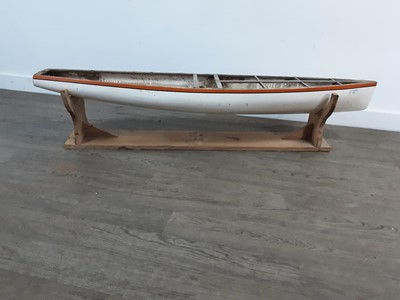 Lot 553 - A FIBRE GLASS POND YACHT HULL