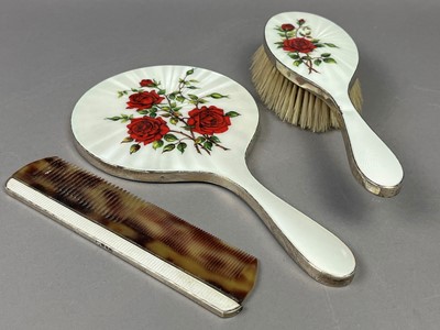 Lot 556 - A SILVER DRESSING TABLE SET AND A TEASPOON