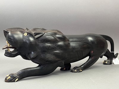 Lot 548 - A HARDWOOD CARVED LION AND ANOTHER