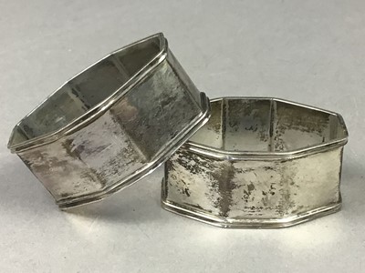 Lot 6 - A COMPOSITE GROUP OF SEVEN SILVER NAPKIN RINGS