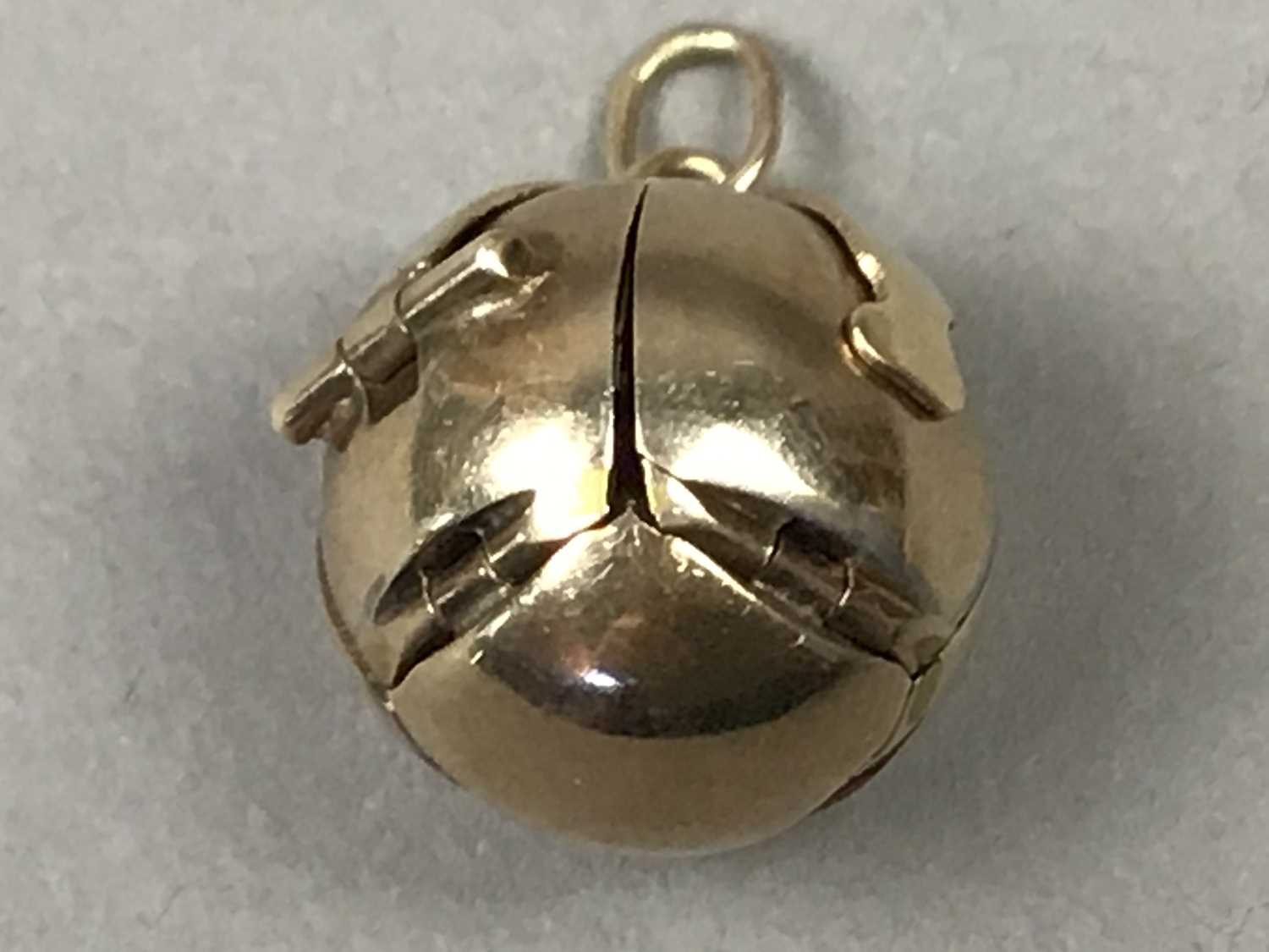 Lot 7 - A SILVER GILT MASONIC BALL PENDANT