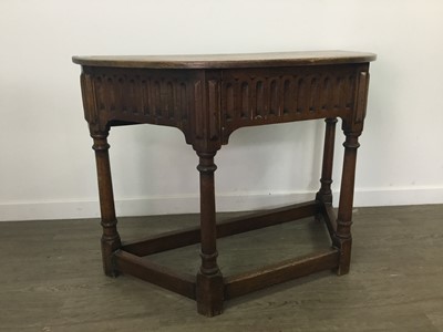 Lot 138 - AN OAK DEMI LUNE HALL TABLE