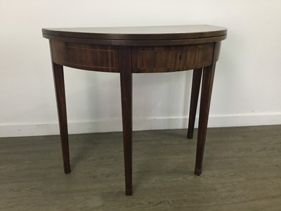 Lot 142 - A MAHOGANY TURNOVER TEA TABLE