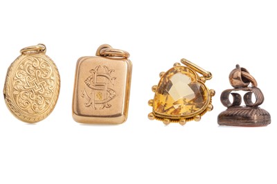 Lot 1180 - TWO GOLD LOCKETS, A CITRINE PENDANT AND A SEAL FOB