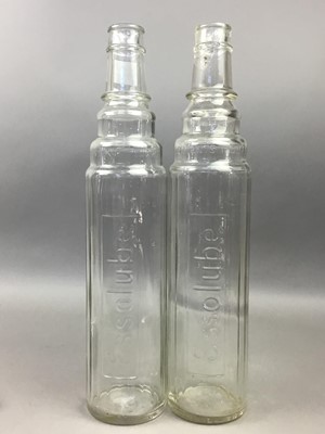 Lot 118 - A PAIR OF EARLY 20TH CENTURY ESSO LUBE GLASS BOTTLES