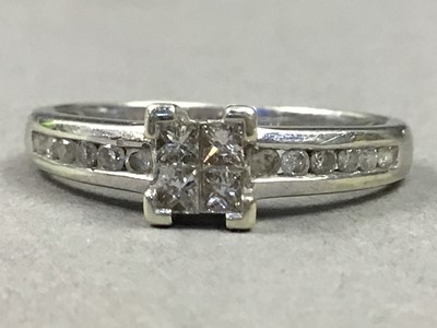 Lot 99 - A NINE CARAT WHITE GOLD DIAMOND SET RING