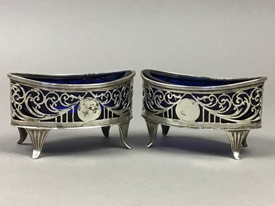 Lot 270 - A PAIR OF SILVER SALT CELLARS, A CRUET SPOONS AND A SILVER TEASPOON