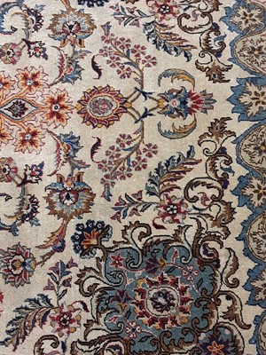 Lot 853 - A PERSIAN KASHAN RUG