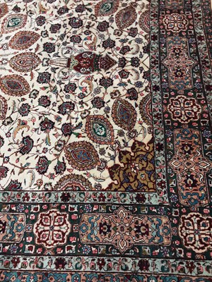 Lot 1239 - A PERSIAN TABRIZ RUG