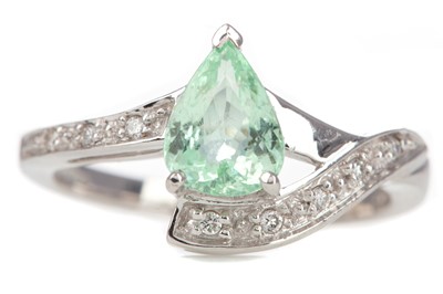 Lot 1212 - A PALE GREEN GEM SET AND DIAMOND RING