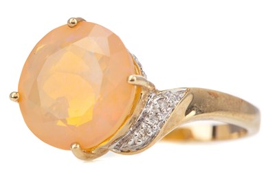 Lot 1224 - A FIRE OPAL AND DIAMOND RING